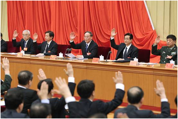 Wang Qishan (center), China’s anti-corruption czar, attends the 6th plenary session of the 18th CPC Central Commission for Discipline Inspection in Beijing, China. (Photo by: Xinhua, Source: Wall Street Journal)